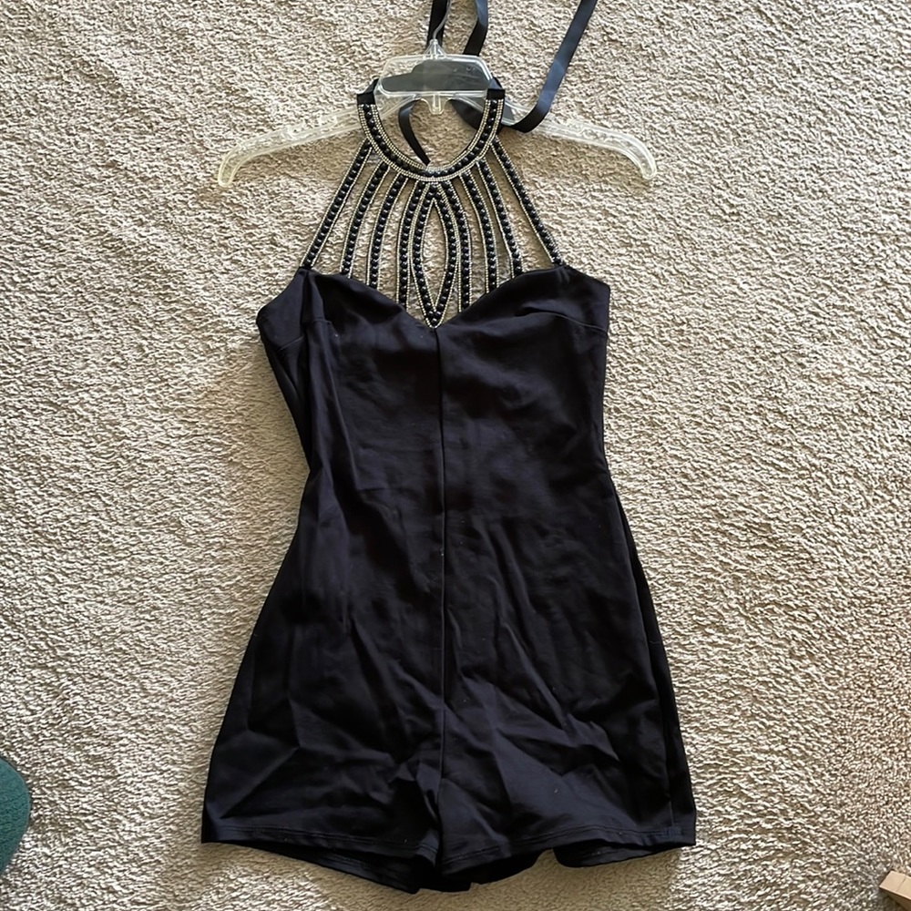 Brand New, Never Worn. Charlotte Russe Black Romper Size Small